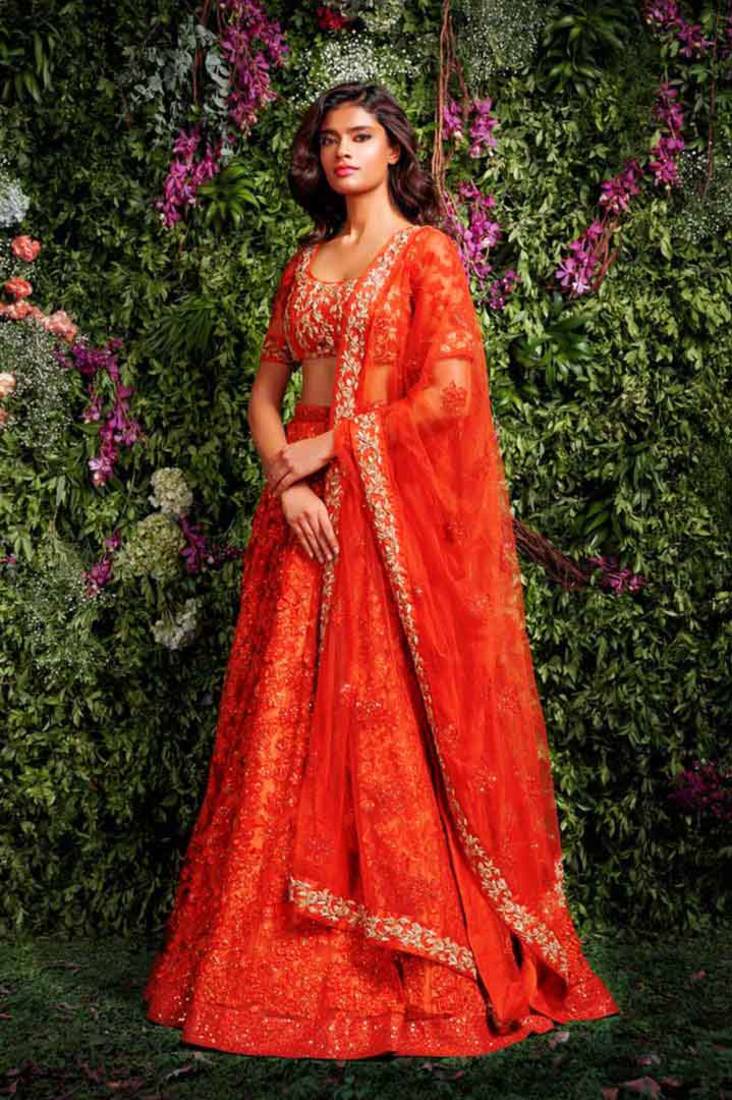 Orange embroidered net  lehenga choli