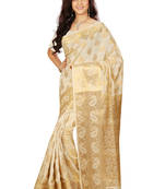 Chikoo woven tussar_silk saree With Blouse
