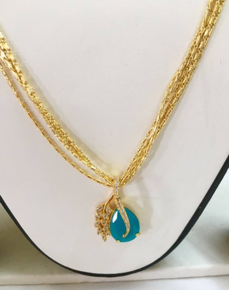 Gold and Light blue Pendant set