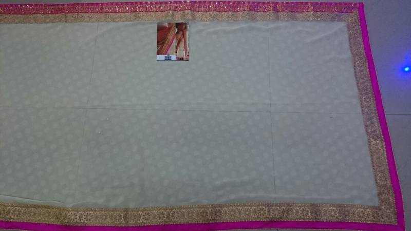 Off White Embroidered Georgette Saree With Blouse