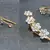 White stone golden kaan earrings