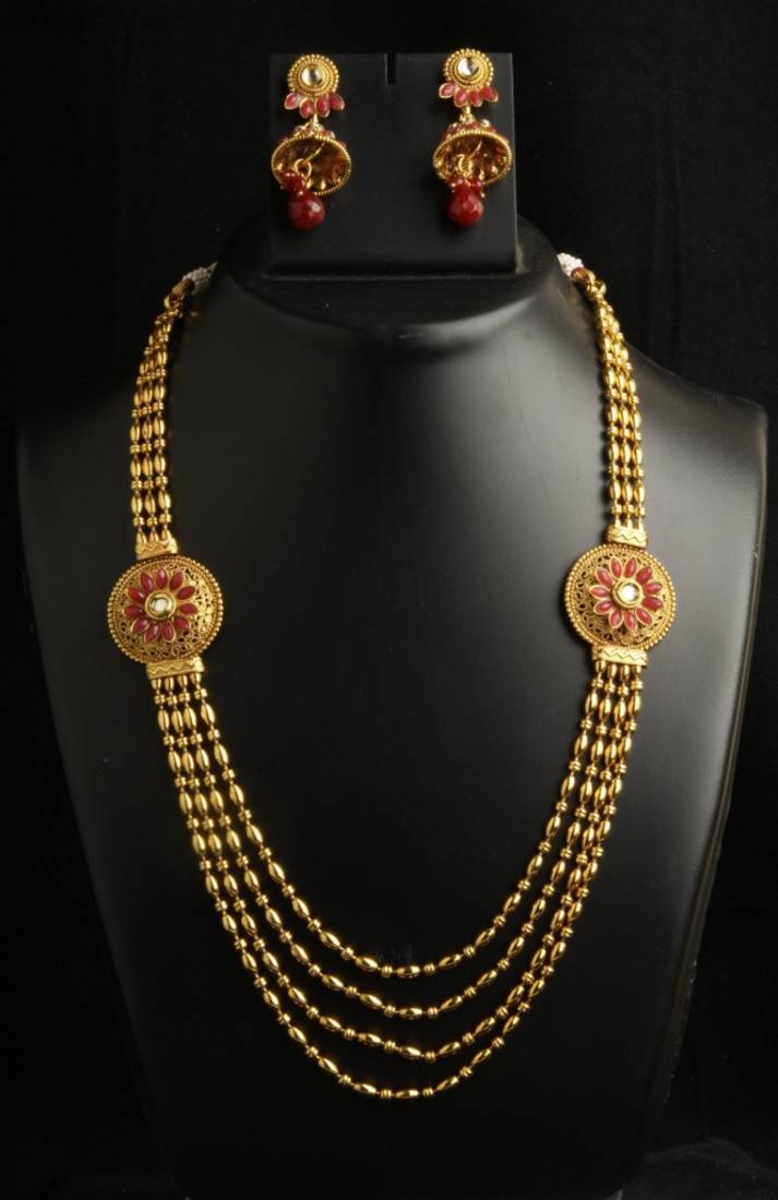 Four layered Gold look long necklace 