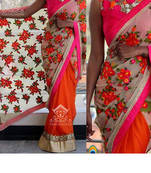 Orange And Cream Embroidered Georgette Saree With Blouse