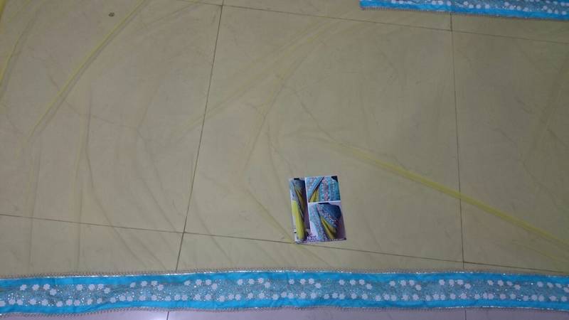 Yellow And Blue Embroidered Nylon Mono Net Saree With Blouse