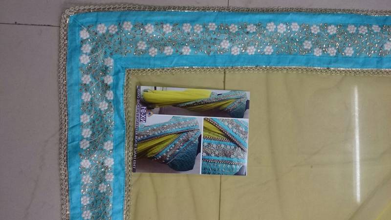 Yellow And Blue Embroidered Nylon Mono Net Saree With Blouse