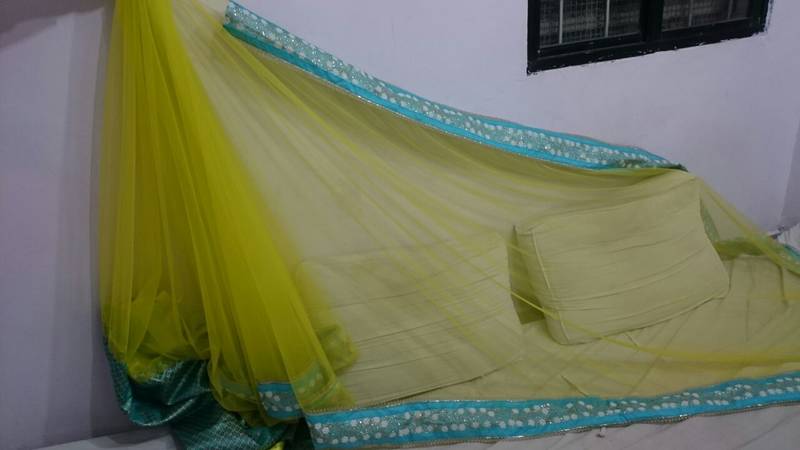 Yellow And Blue Embroidered Nylon Mono Net Saree With Blouse