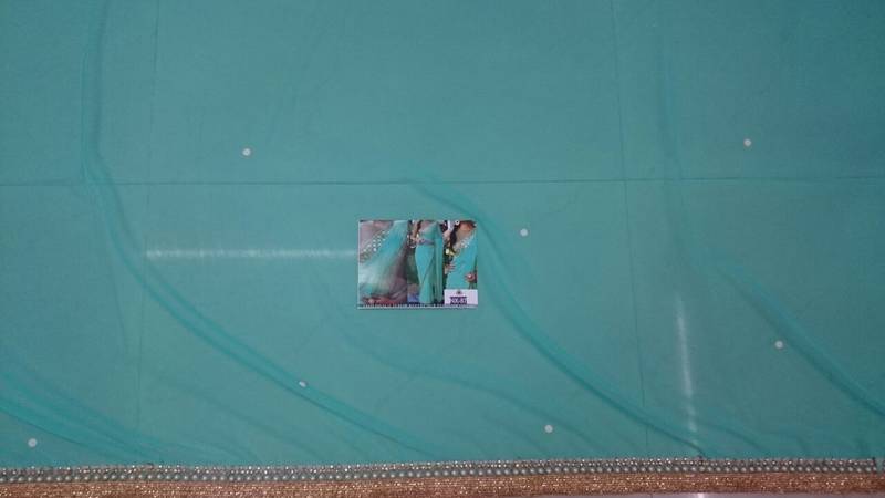 Cyan Embroidered Georgette Saree With Blouse