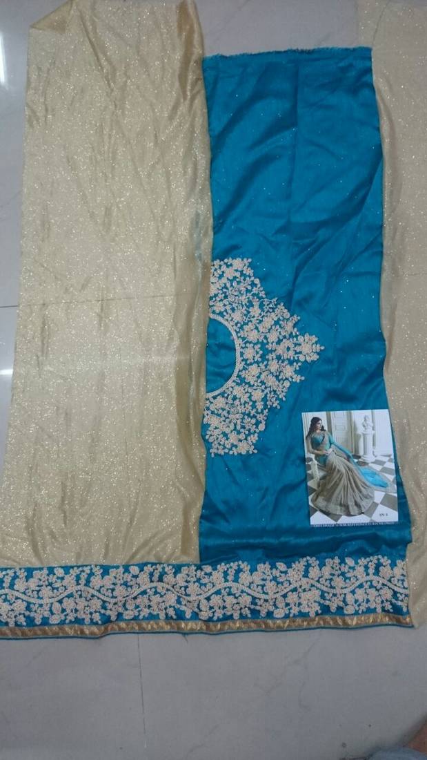 Cream And Cyan Embroidered Georgette Saree With Blouse