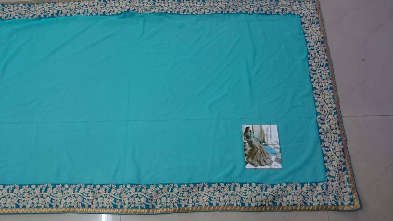 Cream And Cyan Embroidered Georgette Saree With Blouse