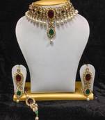 Close Neck Style Kundan Jewelry in Red with Green and Pearls