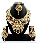 Designer golden white stone bridal necklace set with maang tikka