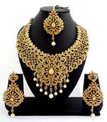 Designer golden stone bridal necklace set with maang tikka