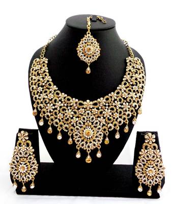 Designer golden white stone bridal necklace set with maang tikka 1