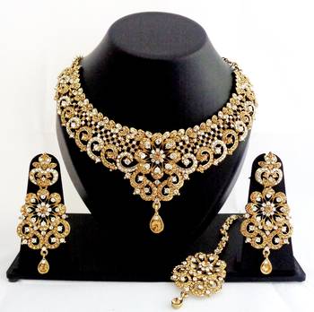 Designer golden white stone wedding necklace set with maang tikka 1