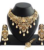 Designer golden white stone wedding necklace set with maang tikka