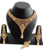 Designer golden stone necklace set with maang tikka