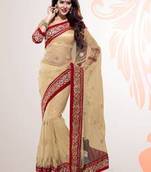 Beige Embroidered Net Party Wear Saree With Blouse