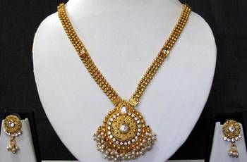 Golden chain round pendant stone ghungaru necklace set 1