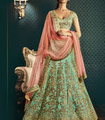 dark aqua blue embroidered art silk unstitched lehenga