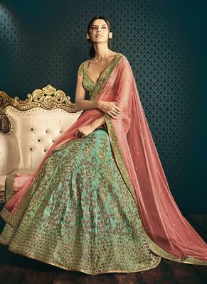 dark aqua blue embroidered art silk unstitched lehenga 2