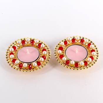 Pair of pearl with crystal diyas 1