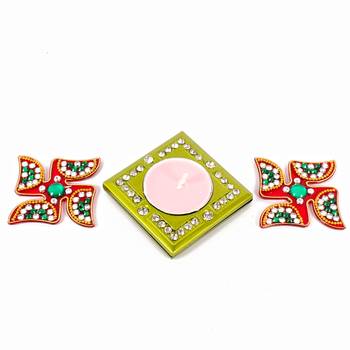 Acrylic swastika and diya 2