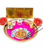 Swastika diwali thali and earthen diya with gold plated lakshmi note