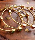 Gold stone bangles and bracelets