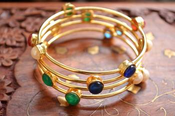 Gold stone bangles and bracelets 1