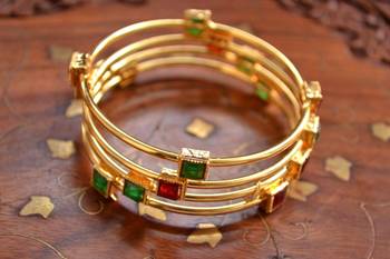 Gold stone bangles and bracelets 1