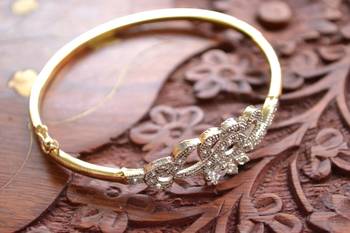 Gold stone bangles and bracelets 1