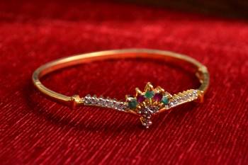 Gold stone bangles and bracelets 1