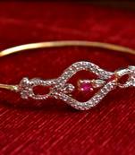 Gold stone bangles and bracelets