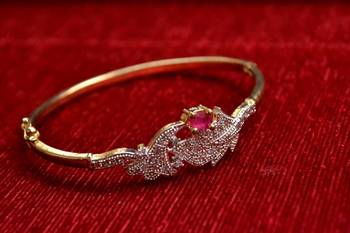 Gold stone bangles and bracelets 1