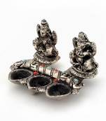 White metal lord laxmi ganeshas with diya set