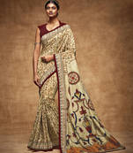 Beige printed tussar silk saree with blouse