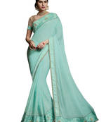 cyan embroidered satin saree with blouse
