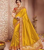 dark yellow embroidered silk saree with blouse