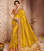 Dark gold embroidered silk saree with blouse