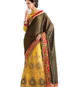 Yellow embroidered georgette saree with blouse