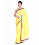 Yellow plain art silk saree with blouse