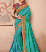 Dark sea green embroidered art silk saree with blouse