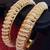Pair of really glowing golden pear bangles q9
