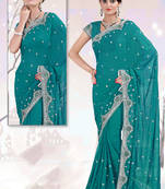 Turquoise embroidered georgette saree with blouse