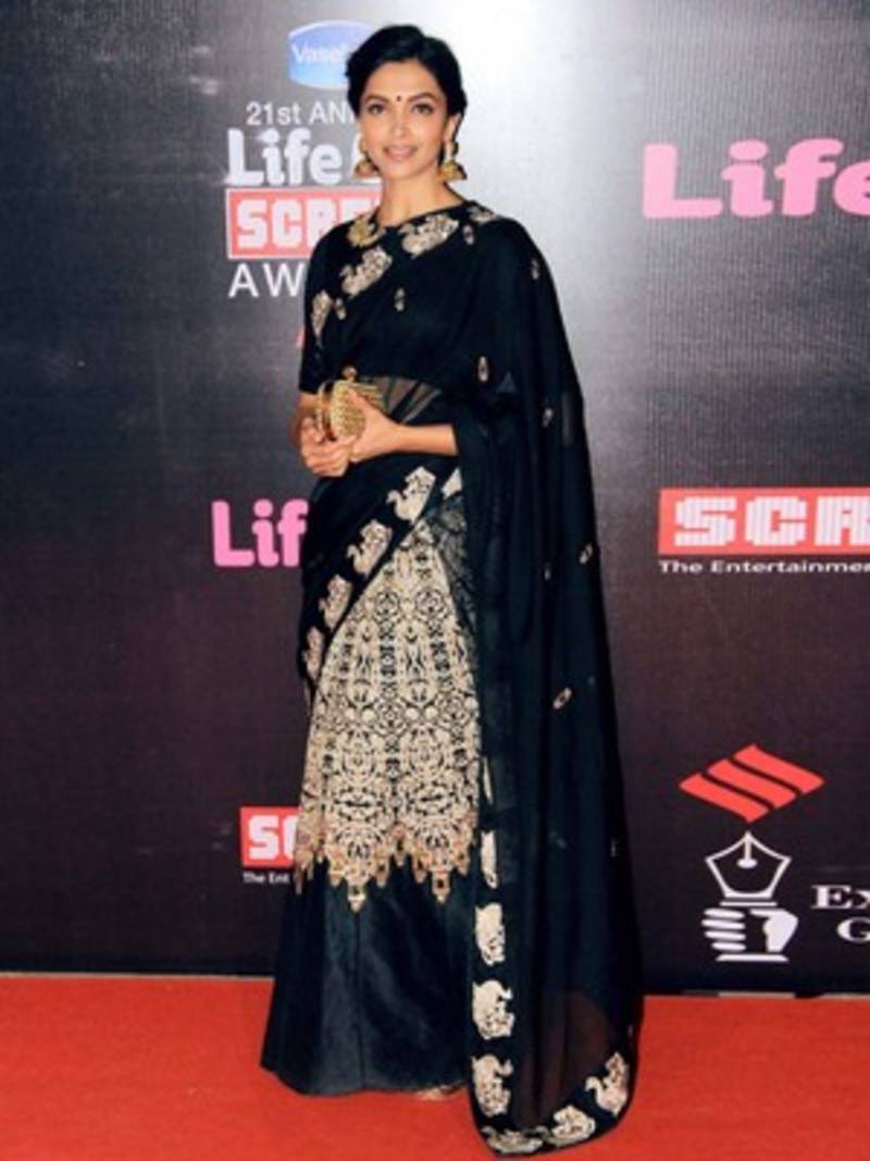 Black embroidered velvet saree with blouse