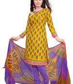 Yellow embroidered faux crepe unstitched salwar with dupatta