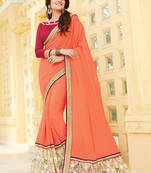 Orange embroidered georgette saree with blouse