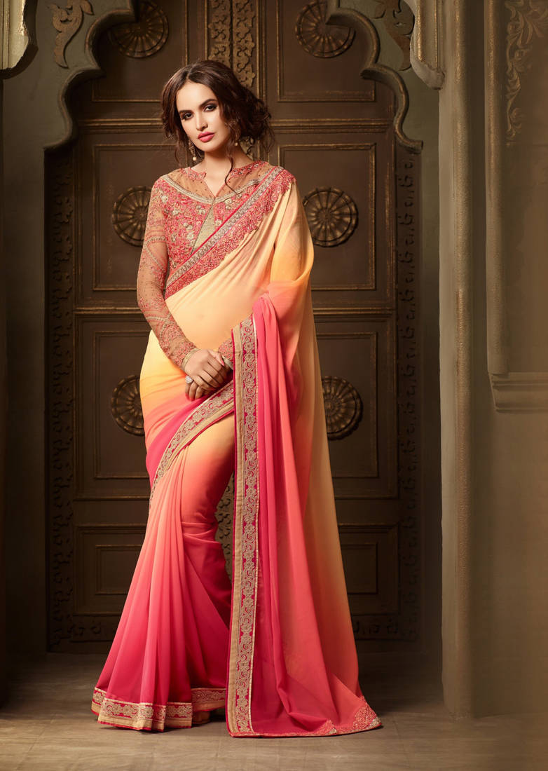 Yellow embroidered georgette saree with blouse