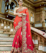 Orange embroidered georgette saree with blouse