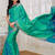 Green and blue dual tone zari weaved silk saree with blouse